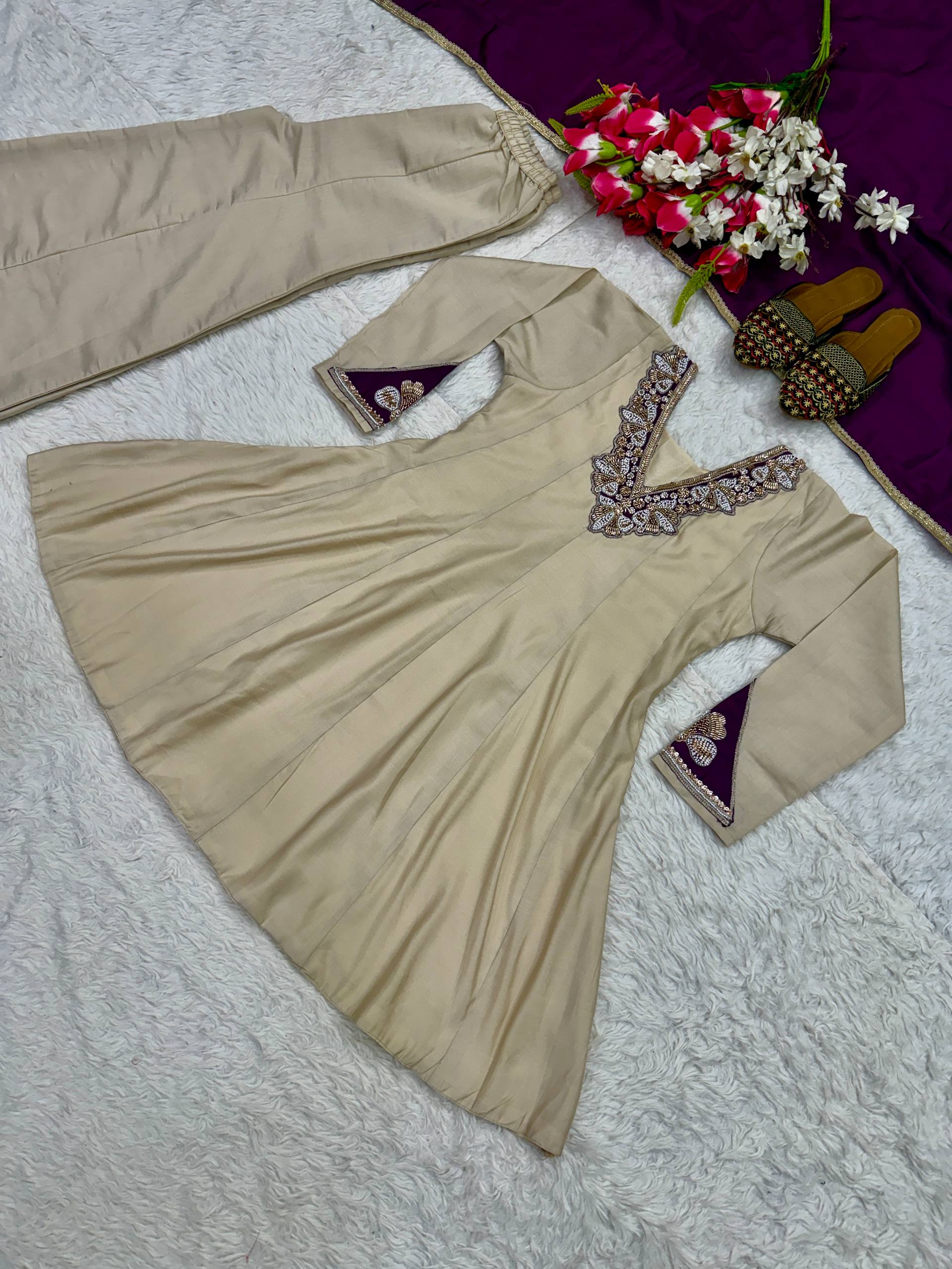 Regal Cream Silk Peplum Kurti and Flared Palazzo Suit Set Adorned with Ornate V-Neck Embroidery and a Rich Plum Purple Dupatta